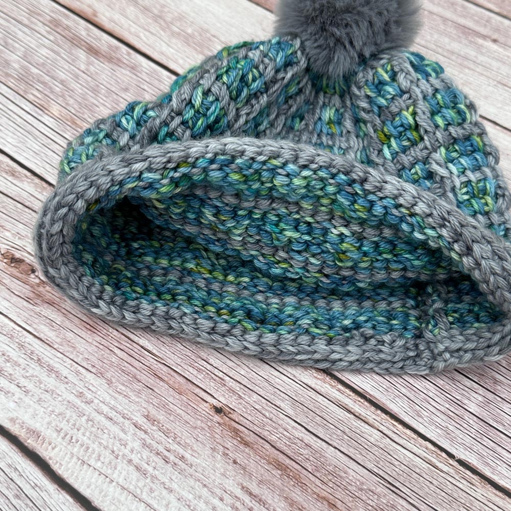 Grey and green double thickness cosy crochet hat.