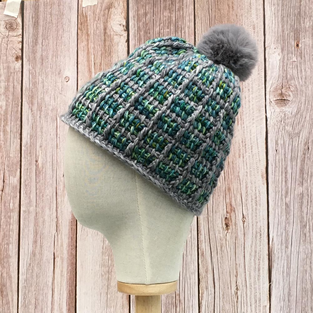 Grey and green double thickness cosy crochet hat.
